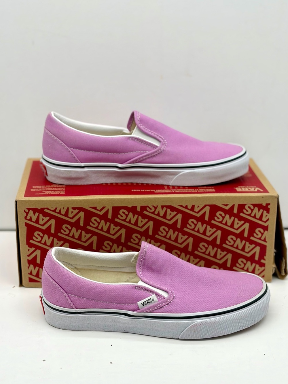 Vans Classic Slip-On Canvas Sneakers in Light Pink